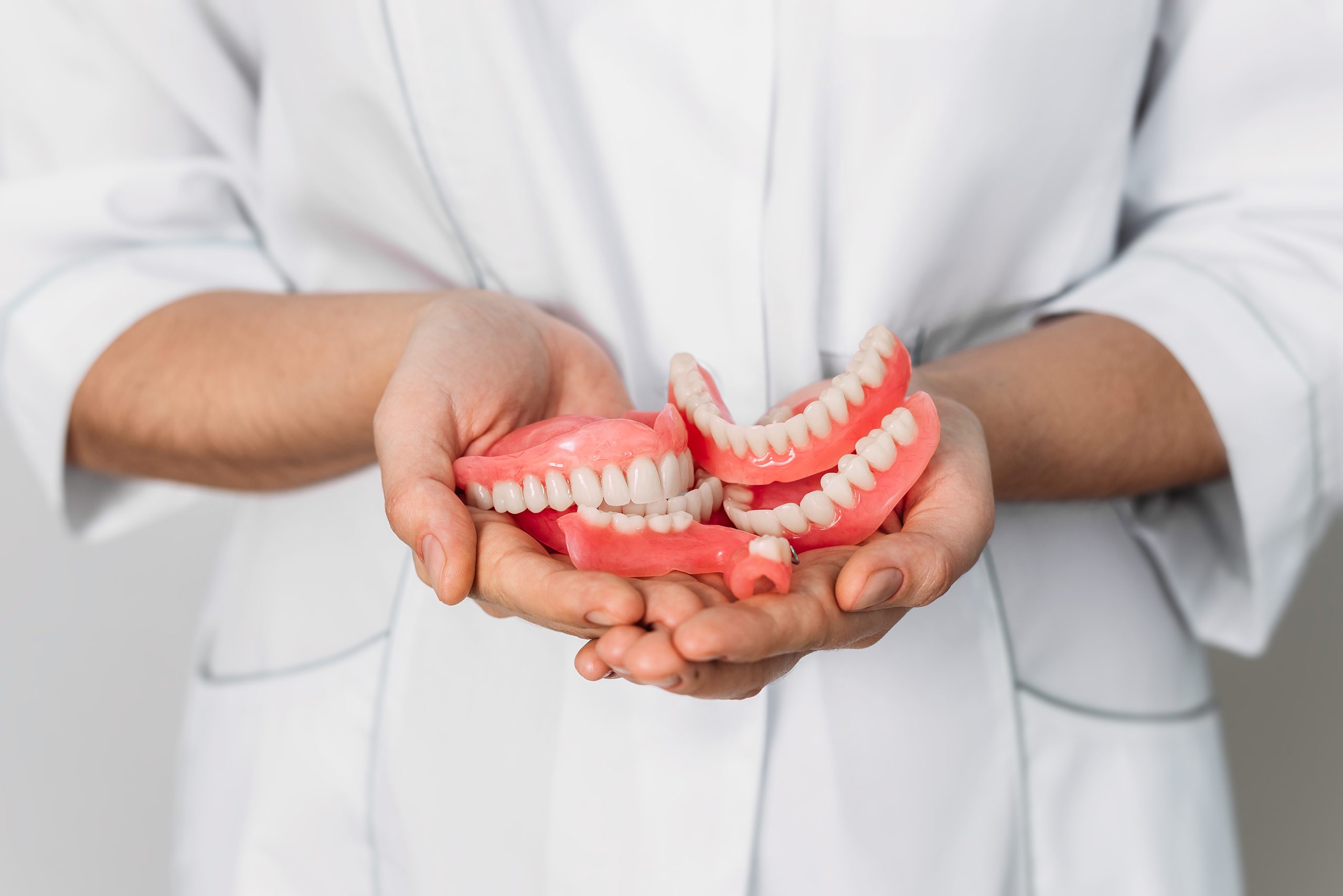 An Orthopedic Dentist Holds Dentures In His Hands 2023 11 27 04 59 17 Utc